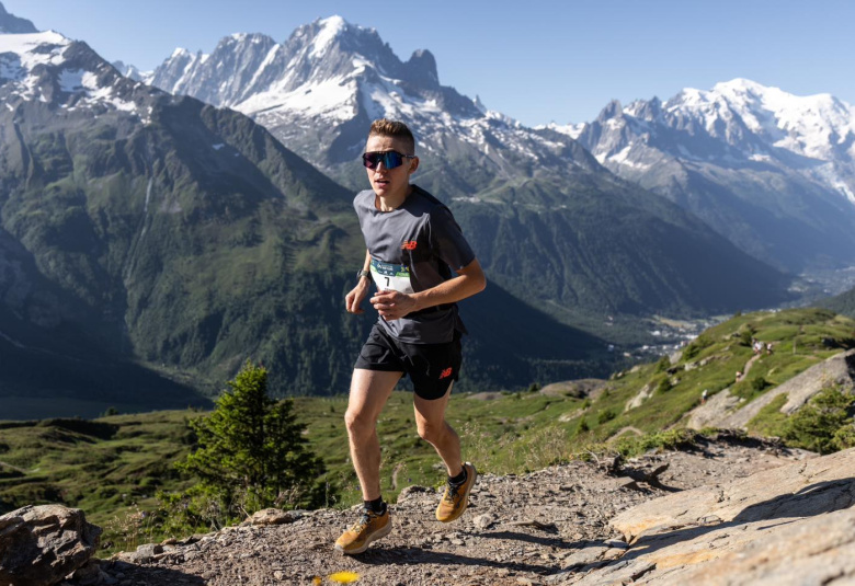 Runner with Mont-Blanc, Chamonix Aiguilles, Le Dru and La Verte all in background during Mont-Blanc Marathon 2025