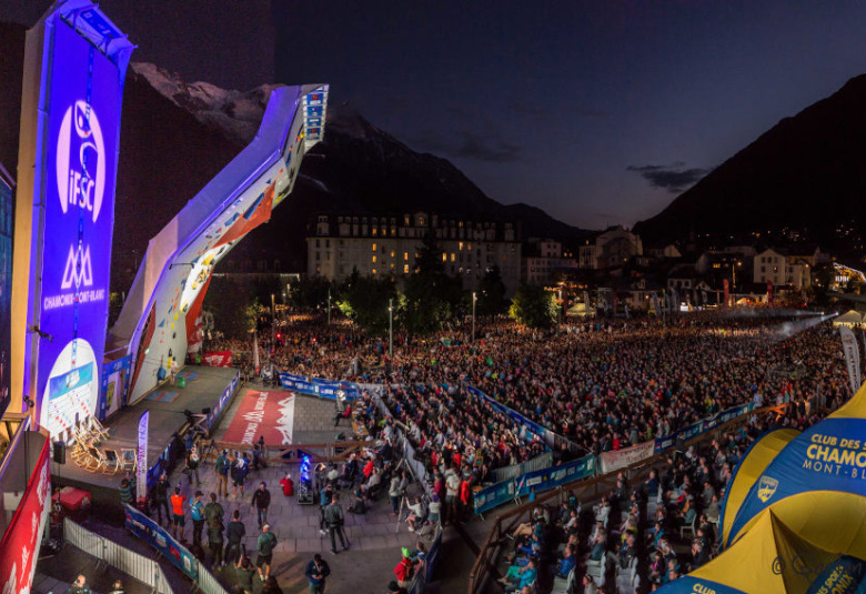 Athletes competing on the outdoor climbing wall at the Chamonix Climbing World Cup, July 2024