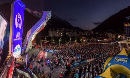 Athletes competing on the outdoor climbing wall at the Chamonix Climbing World Cup, July 2024