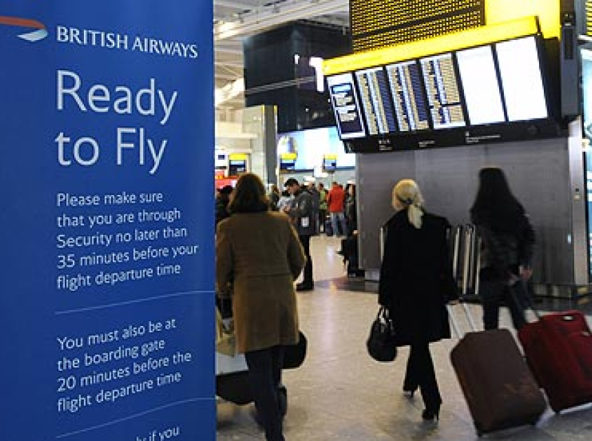 Passengers move through gates